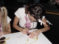 PlayboyMerrittSigningBeads